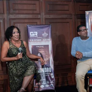 A bird sitting on a nest of eggs.