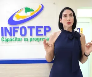 A bird sitting on a nest of eggs.