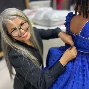 A bird sitting on a nest of eggs.