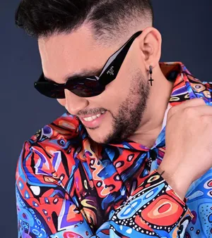 A bird sitting on a nest of eggs.